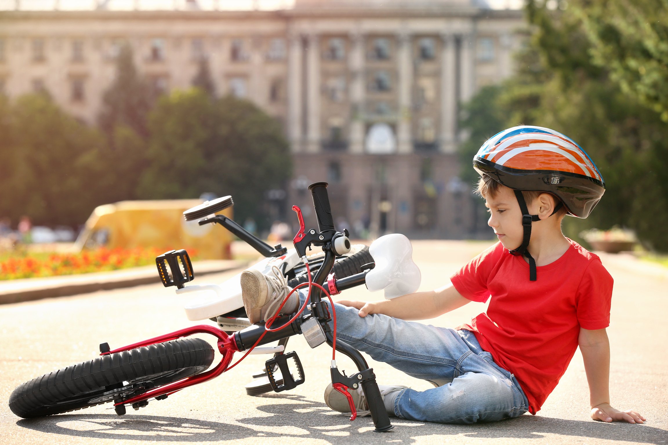 Little Boy Falling from His Bike Outdoors